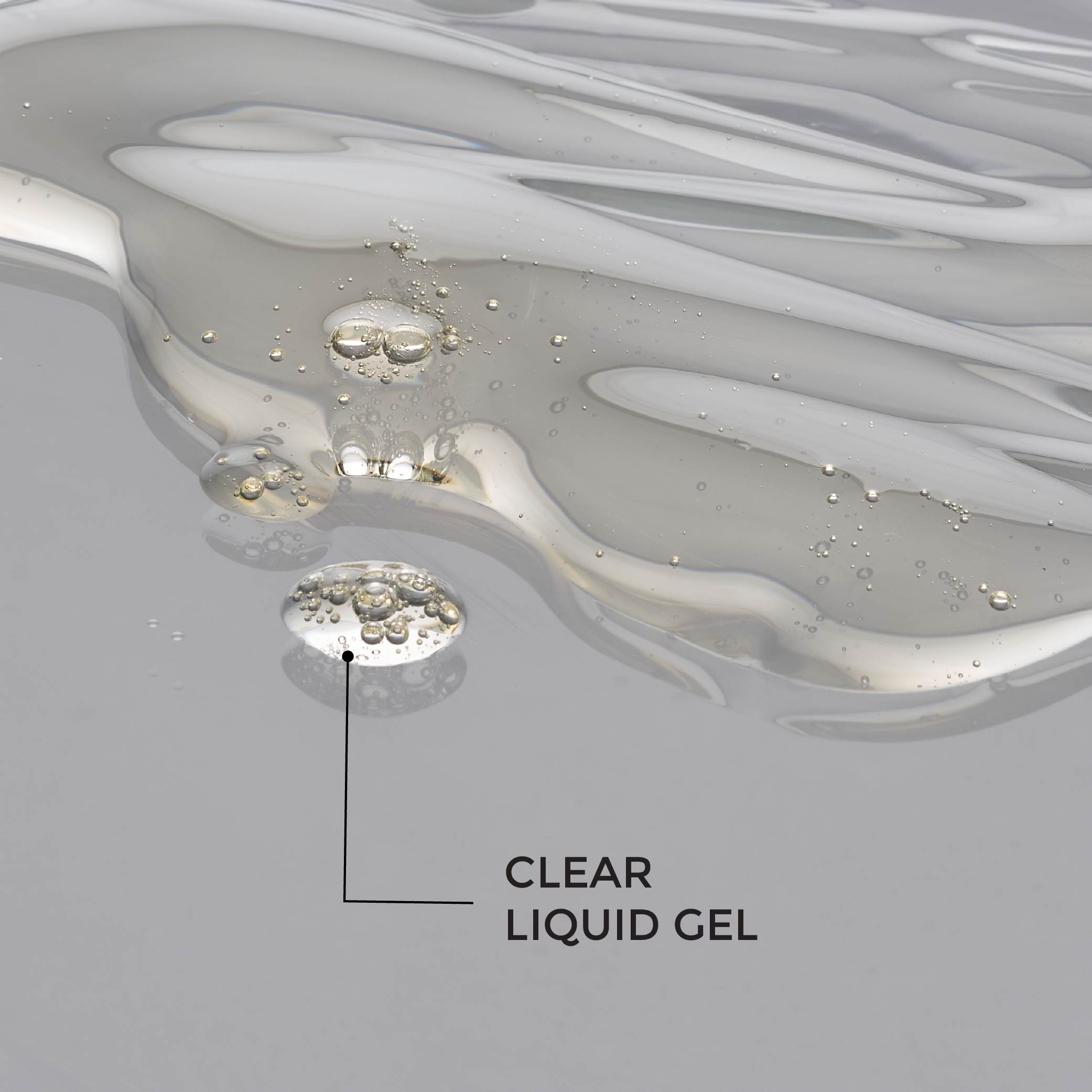 Dropper releasing Illuminate Face Serum — lightweight clear serum texture for skin